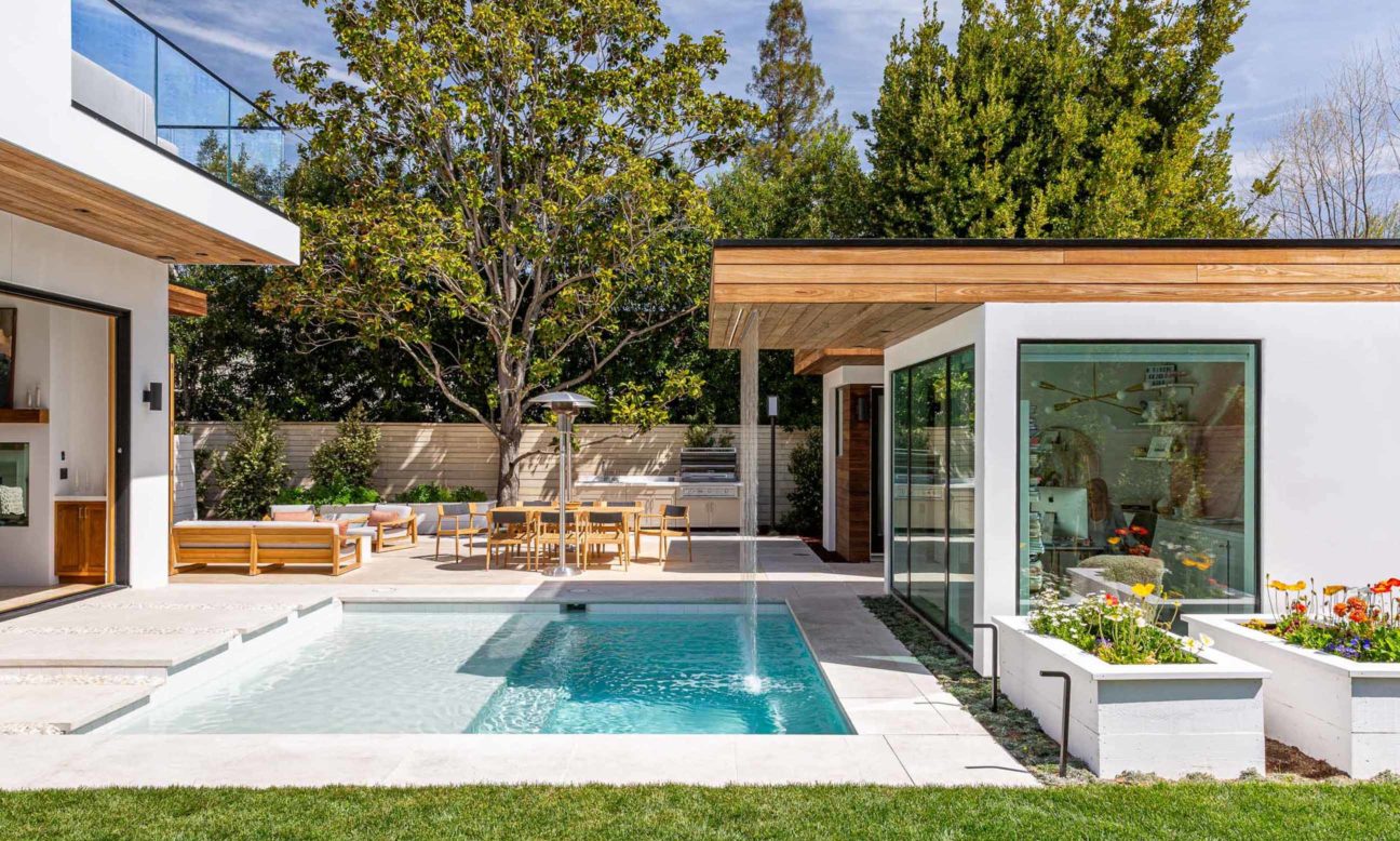 pool and outdoor seating at warm modern home